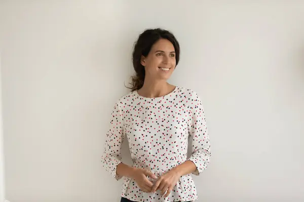 Happy woman isolated on grey background thinking — Stock Photo, Image