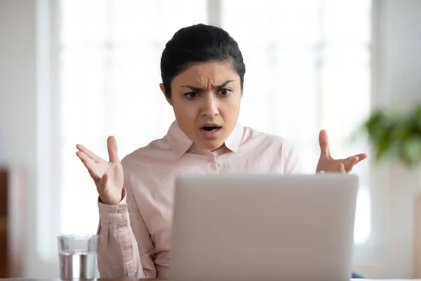 Shocked worried female employee getting unexpected bad news — Stock Photo, Image