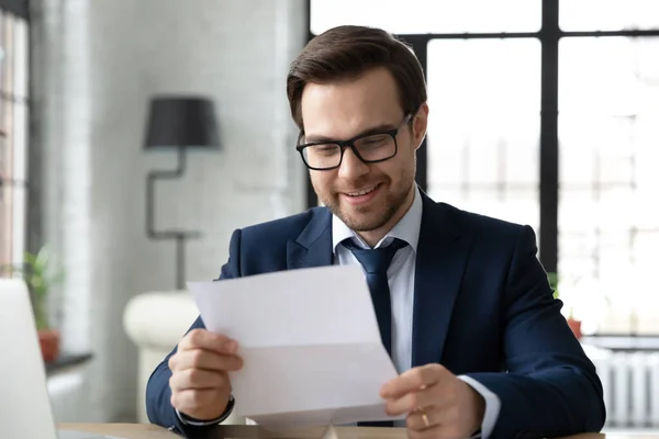 Happy male CEO read good news in correspondence — Stock Photo, Image