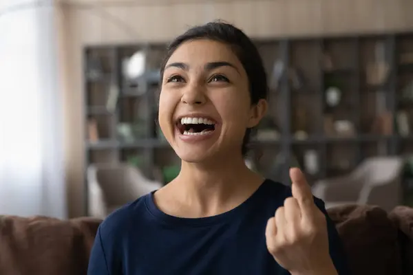 Overjoyed young Indian woman have fun at home — Stock Photo, Image