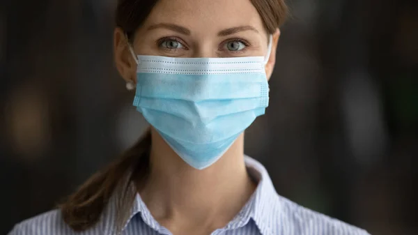 Headshot portrait of woman in facemask from covid-19 — Stock Photo, Image