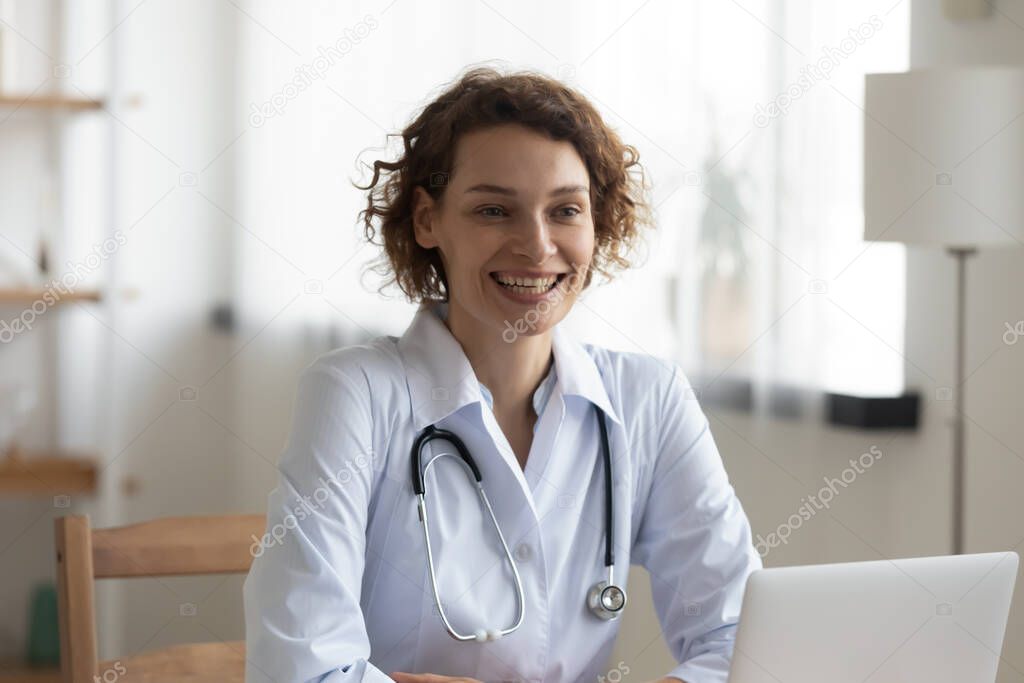 Smiling female doctor talk consult patient in hospital
