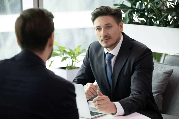 Caucasian businessman have meeting with client in office