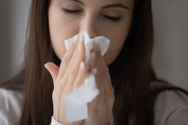 Unhappy millennial girl feeling unwell, suffering from flu infection — Stock Photo, Image