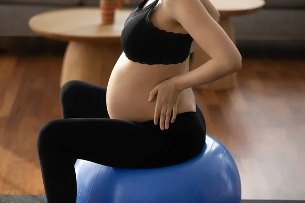 Close up of pregnant woman exercise on fitball — Stock Photo, Image