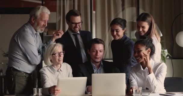 Happy diverse multiracial managers developing company strategy. — Stock video