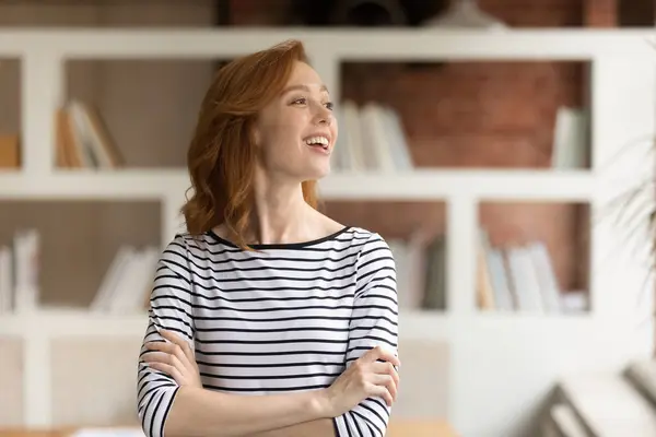 Head shot smiling dreamy motivated businesswoman looking to aside — Stock Photo, Image