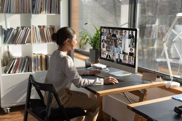 Indian businesswoman involved in internet meeting with colleagues, video call — Stock Photo, Image