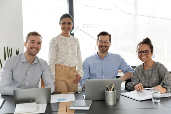 Corporate portrait smiling diverse colleagues employees team in boardroom — Stock Photo, Image