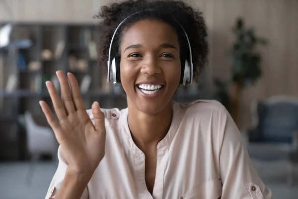 Young african american woman holding web camera call. — Stock Photo, Image