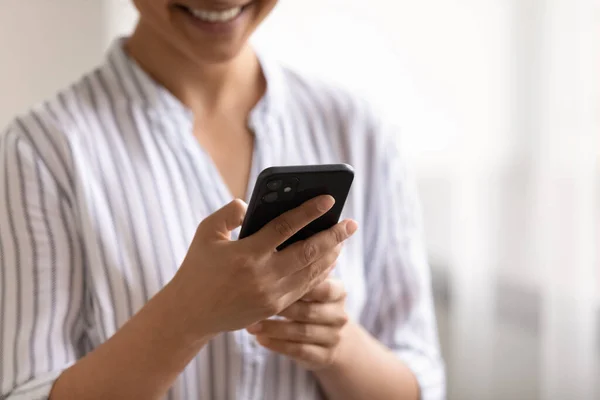 Close up of Indian woman use smartphone texting — Stock Photo, Image