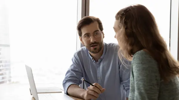 Concentrated young employees discussing online project in office. — Stock Photo, Image