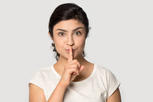 Portrait of happy Indian woman ask be quiet — Stockfoto