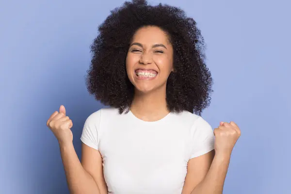 Portrait of happy African American woman celebrate success — Stock Photo, Image