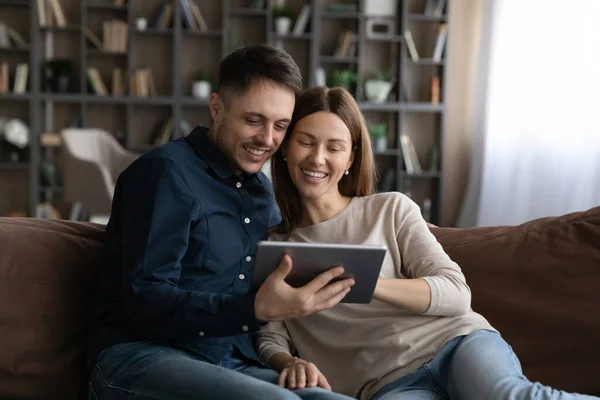 Happy couple use tablet talk on webcam call — Stockfoto