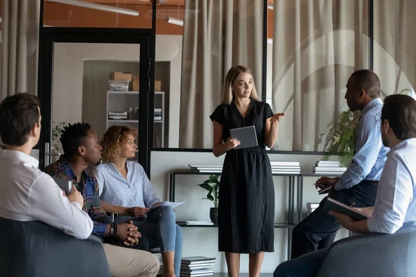 Confident businesswoman mentor leading corporate meeting briefing with diverse employees — Stock Photo, Image