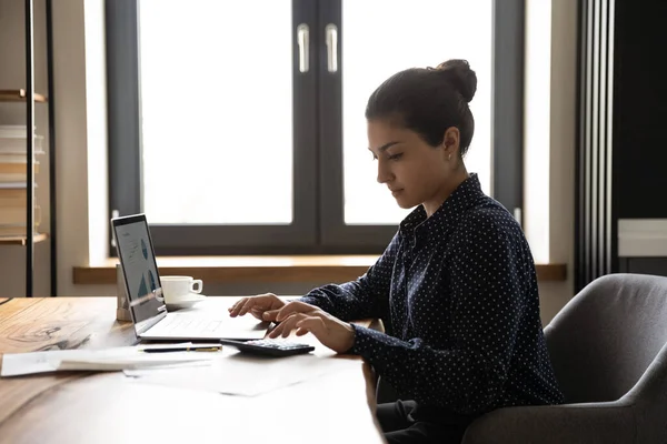 Focused female accountant working from home office — Stock Photo, Image