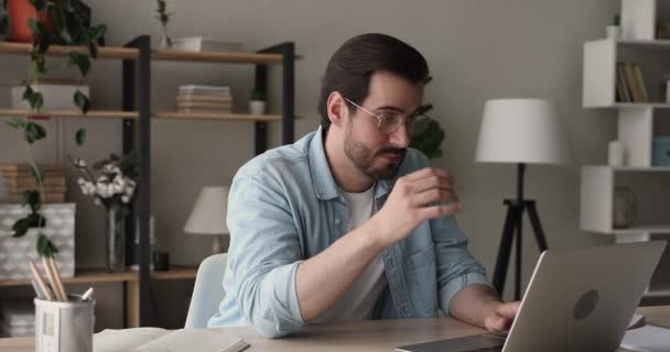 Overwhelmed young stressed man taking off eyeglasses. — Stock videók