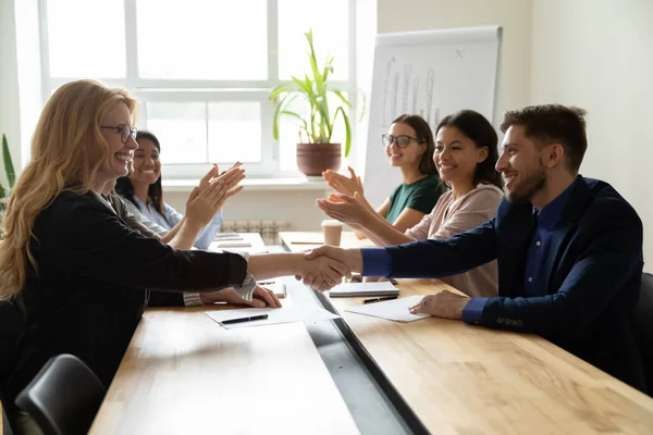 Mature business leader congratulating manager on job promotion or hiring — Stock Photo, Image