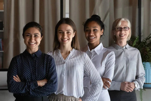 Portrait of happy diverse female business team