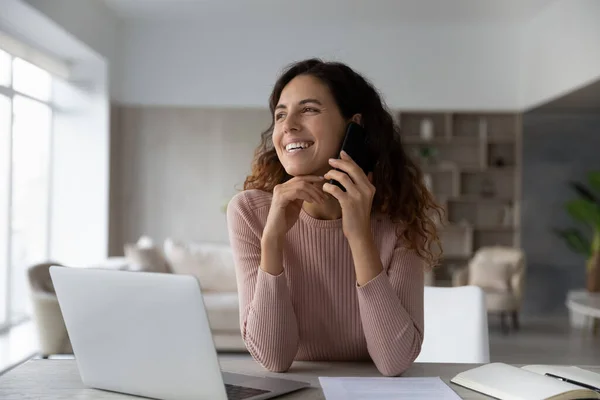 Smiling Latin woman have pleasant cellphone call — Stock Photo, Image