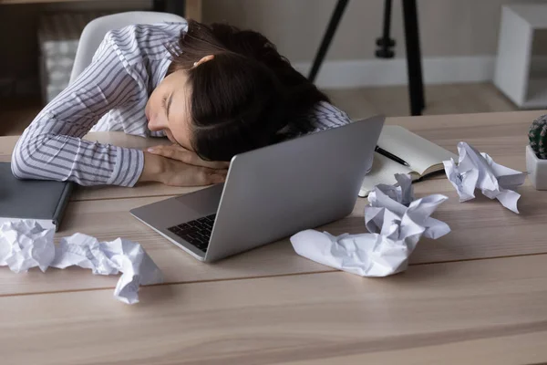 Exhausted woman fall asleep on desk at workplace — 图库照片