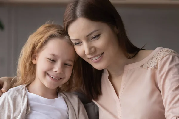 Happy young Caucasian mom and daughter relax together — Zdjęcie stockowe