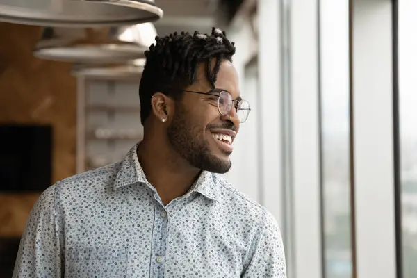 Portrait of successful African man entrepreneur pose in modern office — стокове фото