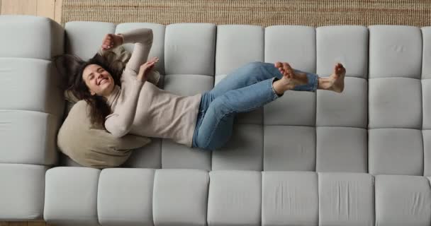 Happy young beautiful woman enjoying carefree relaxation time. — Stok Video