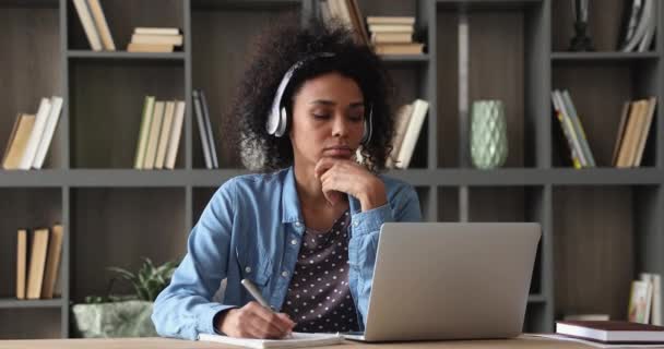 Young african ethnicity woman studying on online courses. — Vídeos de Stock