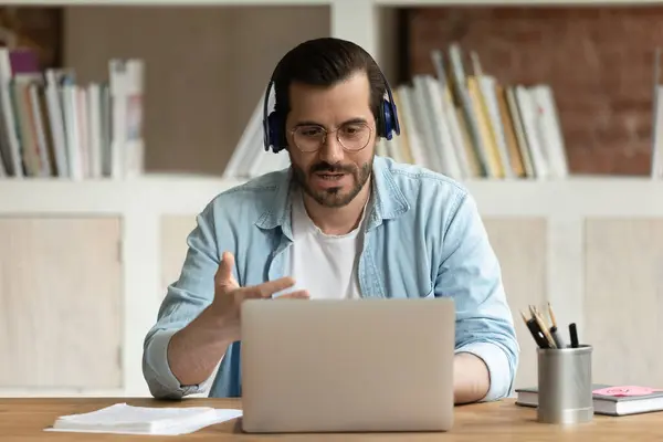 Serious man takes part in online stream communication use laptop — Stock Photo, Image