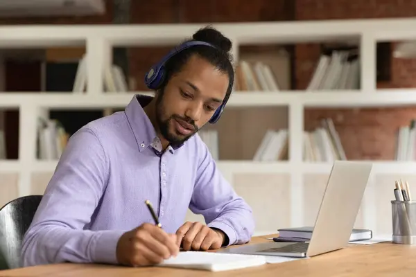 African man e-learning prepare for exams use online audio course — Stock Photo, Image