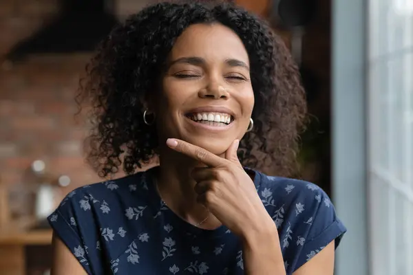 Portrait of happy beautiful millennial African woman touching chin — Stock Photo, Image