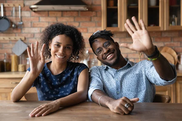 Happy millennial mixed race husband and wife making video call — Stock Photo, Image