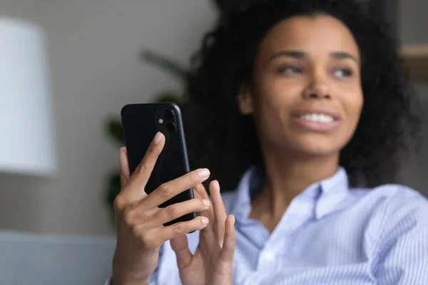 New modern mobile phone gadget in young black female hands — Stock Photo, Image