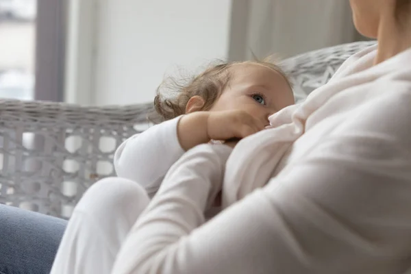 Cute hungry infant sucking breastmilk from mums breast — Stock Photo, Image