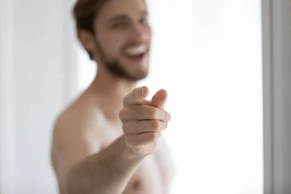 Closeup focus shirtless man point his finger at camera — Stock Photo, Image