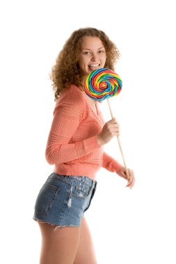 Girl licks giant lollypop  clipart