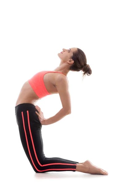 Sporty girl bends backwards — Stock Photo, Image