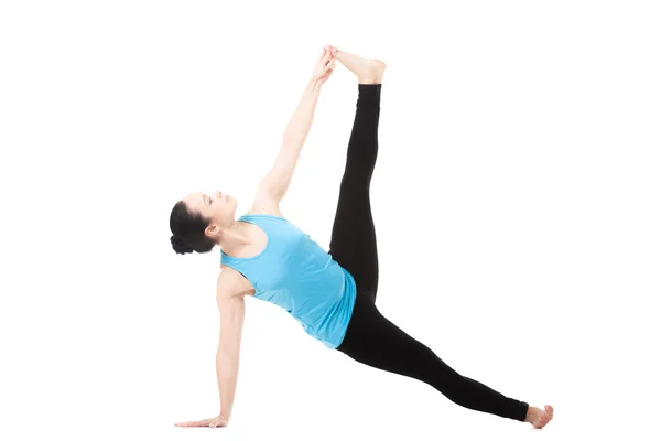 Yogui femenino en yoga Pose Vasisthasana — Foto de Stock