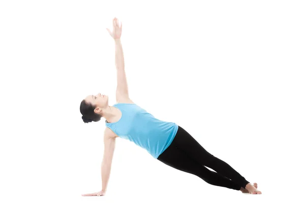 Yogi female in yoga Side Plank Pose — Stock Photo, Image