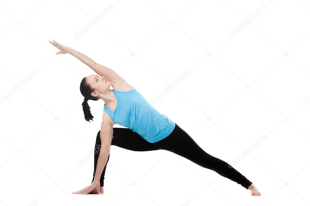 Yogi female in yoga Pose uthitta parshvakonasana 