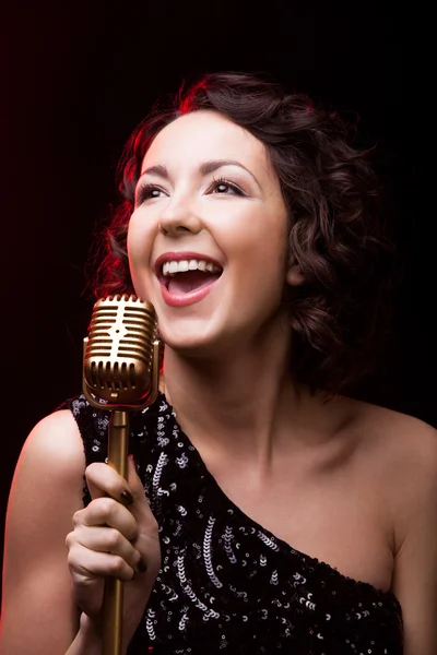 Beautiful brunette woman singing — Stock Photo © zoomteam #11661725