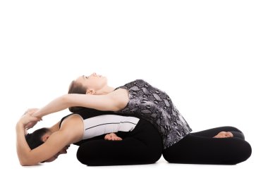 Lotus poz içinde yoga egzersizleri yapıyor yogi kızlar