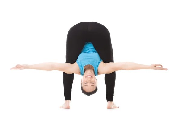 Yogi female in yoga asana bends forward — Stock Photo, Image