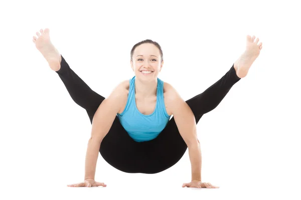 Yogi female in yoga Firefly Pose — Stock Photo, Image