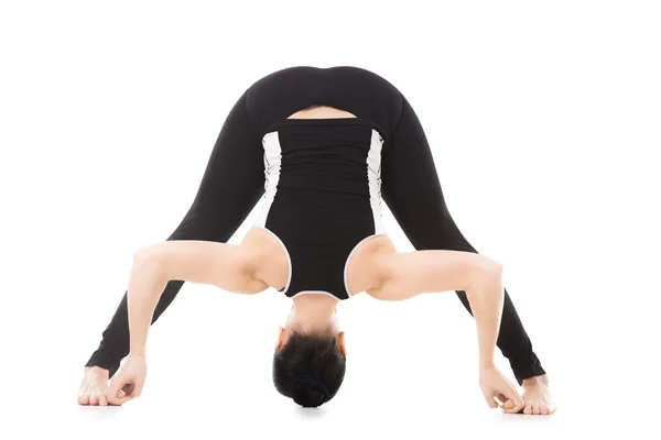 Yogi female exercises, yoga asana Wide-Legged Forward Bend — Stock Photo, Image
