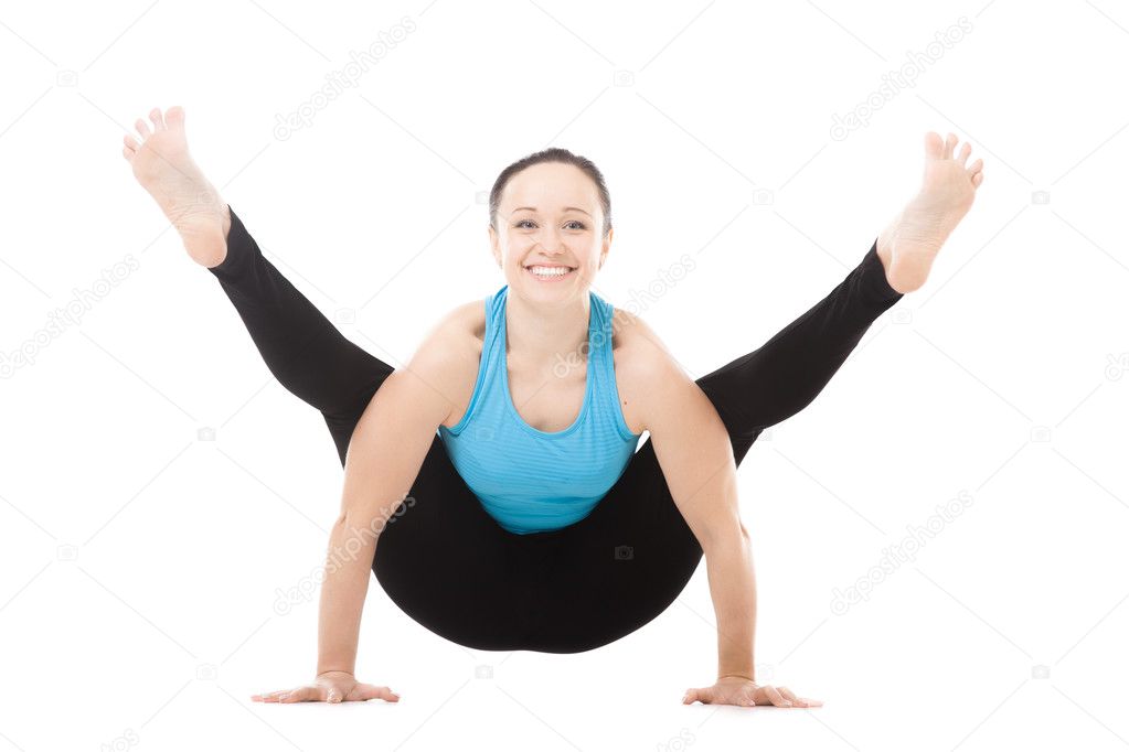 Yogi female in yoga Firefly Pose