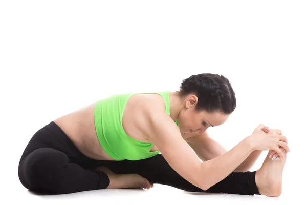 Head-to-Knee forward bend yoga asana — Stock Photo, Image