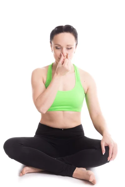 Nadi shodhan pranayama in yoga Easy pose Royalty Free Stock Images